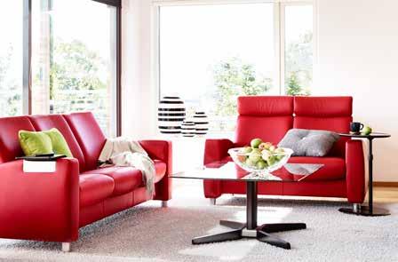 Stressless Arion Sofa shown in Batick Chilli Red/ Steel legs. Stressless Ellipse Table.