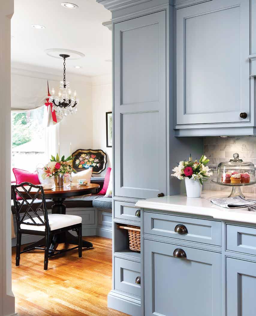 The choice to have windows set into some cabinet doors was for two reasons, to display Linda s