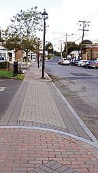 Provide specialty paving where the driveway crosses the sidewalk Section 3 Parking and Service Areas 3.