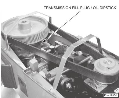 Transmission To check the oil level, remove the top cover, which is secured by two screws. Remove the Transmission Fill Plug (Fig. 8) and check the oil level.