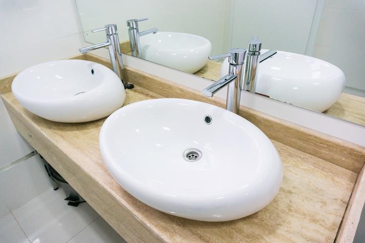 White tile is impossible to keep clean. KatarzynaBialasiewicz/Getty Images White bathrooms (and kitchens) have been trending for a while now, but experts say they may be on their way out. The reason?