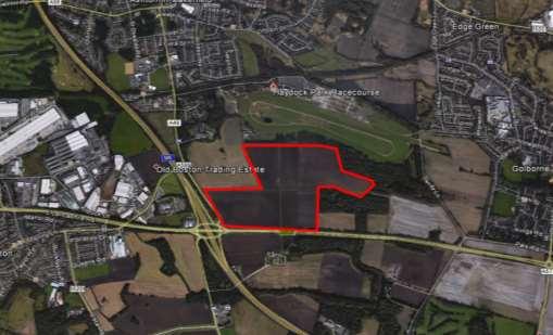 1.9 The site occupies the north-eastern quadrant formed by the junction of the M6 Motorway / A49 / A580. 1.10 It is irregular in shape, extends to 42.3 hectares and comprises agricultural land.