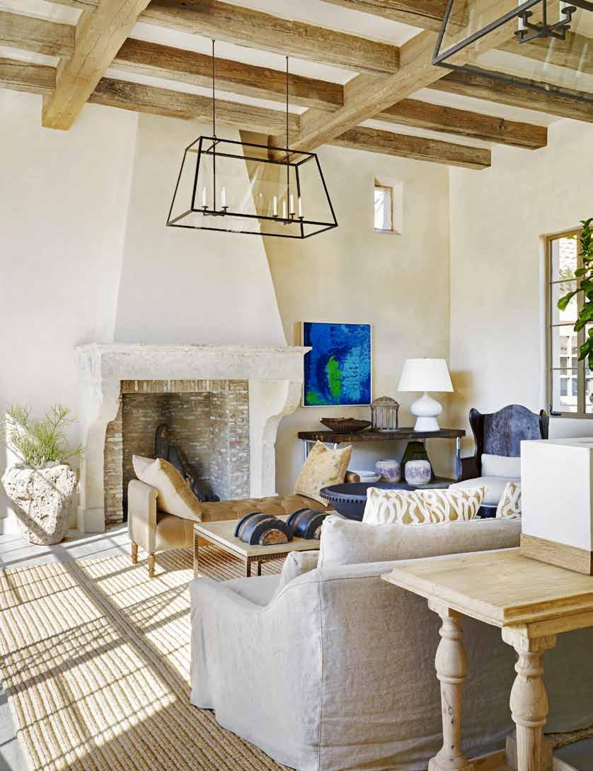 Old meets new in the living room and all through this updated version of a rural French farmhouse.