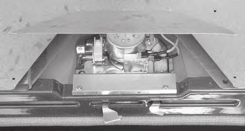 Using a pair of side-cutters, cut the two front joins on the top air duct latch assembly cover, then bend the top and bottom covers up as far