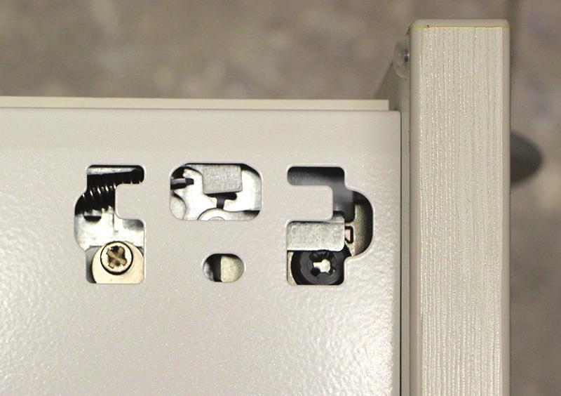 To access the screws, remove the A-dec cover. The screw furthest from the drawer face adjusts up and down alignment.