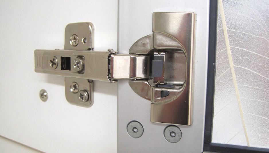 Door hinges include a quick-release tab for easy removal.