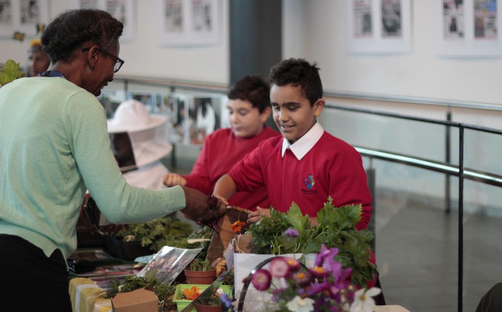 What are the benefits of growing food in schools? Local communities Image: Marketplace, City Hall, 2017. Credit Garden Organic.