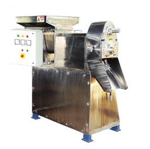 The machine consists of two screws, body, collection tray, feeding bowl and is driven by an electric motor with reduction gear box.