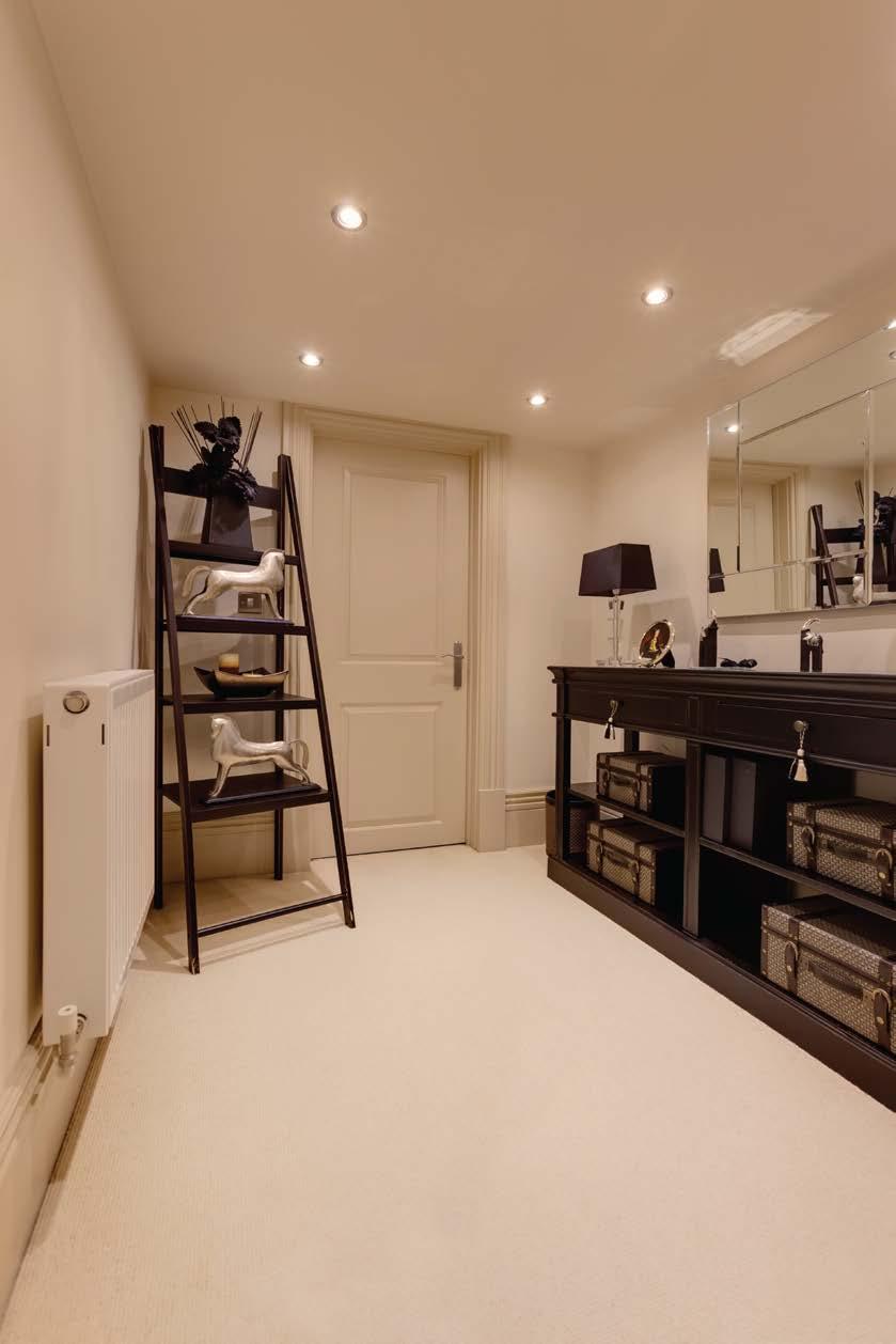 Storage Room A versatile room, with recessed lighting, deep skirtings and a central