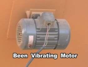 belt life. A bin vibrator provided on dust bin wall ensures easy down flow of dust when wet due to moisture.