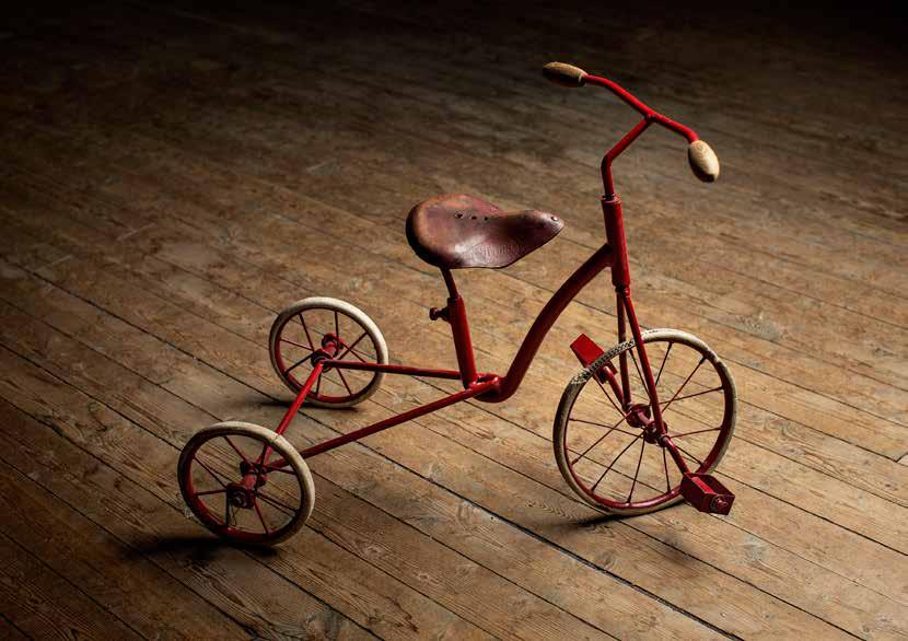 What began as a modest production of small toys and tricycles for