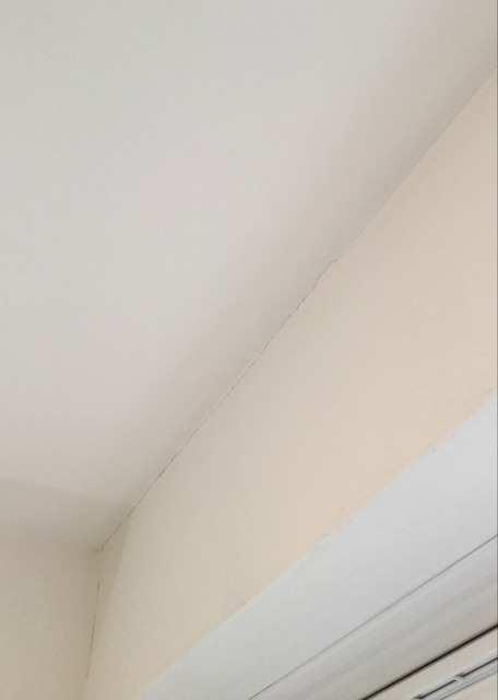 Comparison En-suite - Ceiling En-suite - Ceiling white smooth painted ceiling.