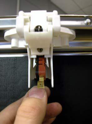 Remove the six screws which secure the dispenser to the inner door.