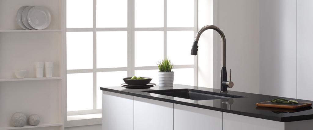 Geo Arch KPF-1702 Single Lever Pull-Down Kitchen Faucet w/ Soap Dispenser The Geo Arch single lever pull-down kitchen faucet has a unique design with two-tone Stainless/SpotLess Black Onyx finish.