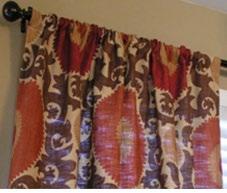 Pencil pleat curtain heading usually consists of three rows of strings threaded through it for three hook positions to suit all types of track and pole.