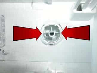 knob pressing the hooks indicated by the