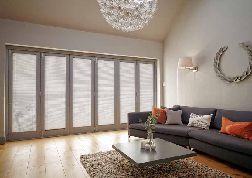 quality of the INTU blind system. Bespoke 16mm pleated fabrics fit within the reveals of bi-fold doors.