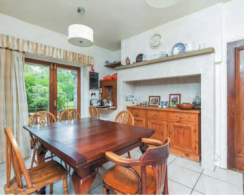 The property is approached via an attractive entrance porch and briefly comprises of kitchen and breakfast room with fitted cupboards, 4 oven electric Aga with gas hob, underfloor heating and French