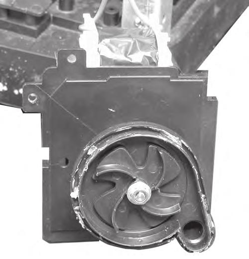 8. Remove the 5/16 nut from the impeller and remove the impeller from the motor shaft.