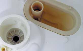 ) Note: When installing fine filter, make sure the drain port of the fine filter is engaged to the vertical drain port of the sump with check ball in between. (See photo below.