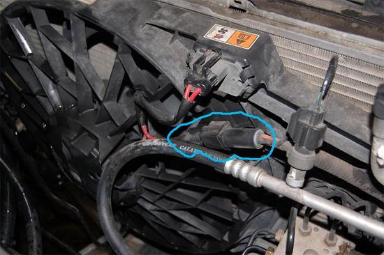 Remove the 8mm bolt, which holds the radiator mount to the radiator support and set the mounts aside.