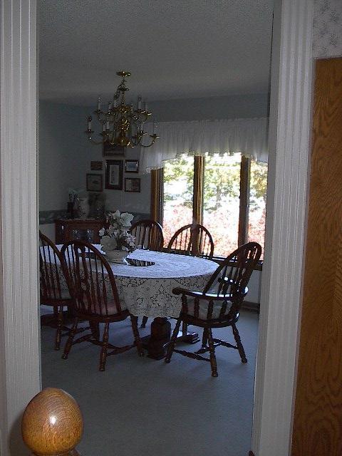 BEFORE PHOTO: #3 Entrance was gained to the underutilized formal dining room by walking down a