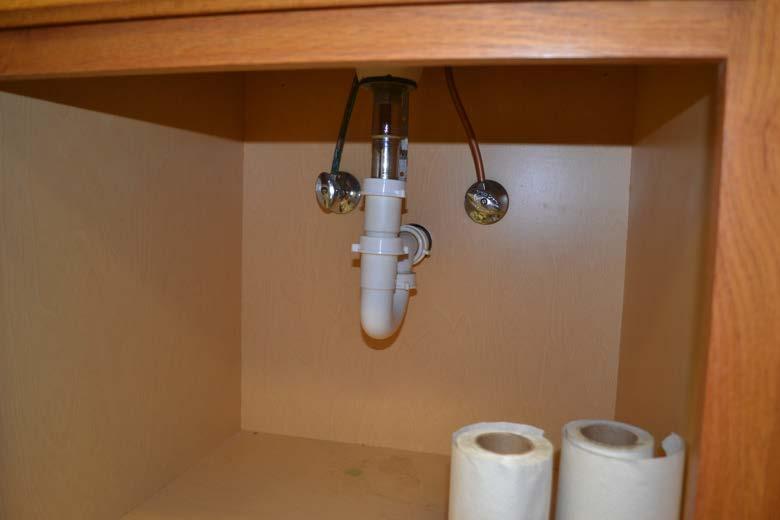 HOT AND COLD WATER PIPES ENCLOSED IN CABINETS ON OUTSIDE WALLS The hot and cold water pipes that supply sinks in enclosed cabinets that are against outside walls are at risk of freezing.