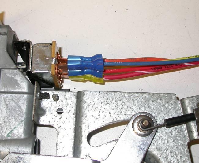 Locate wire harness and attach to the blower switch.