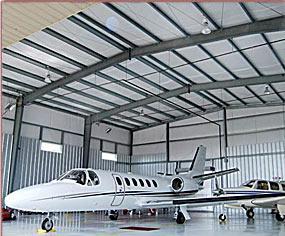 Aircraft Hangars 44) In a small aircraft hanger where the aircraft has its fuel tanks in its wings is it allowed to have electrical outlets on the side walls by the wings for servicing the aircraft?