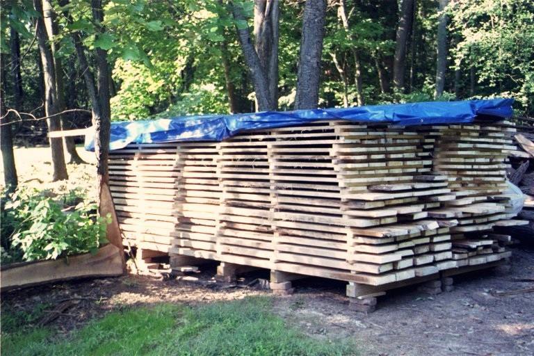 The two most common methods of drying lumber are: Air drying and then kiln