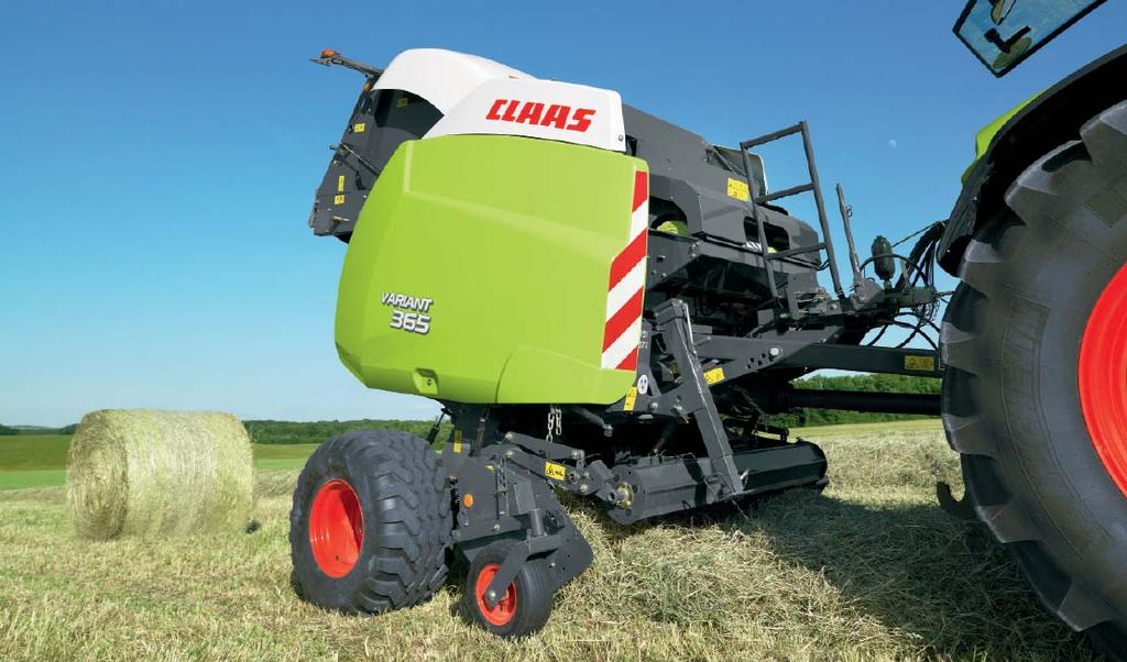 Mature performance profile. The round baler system requires the machine to stop briefly while the bale is being wrapped or tied. That's just the way it works.