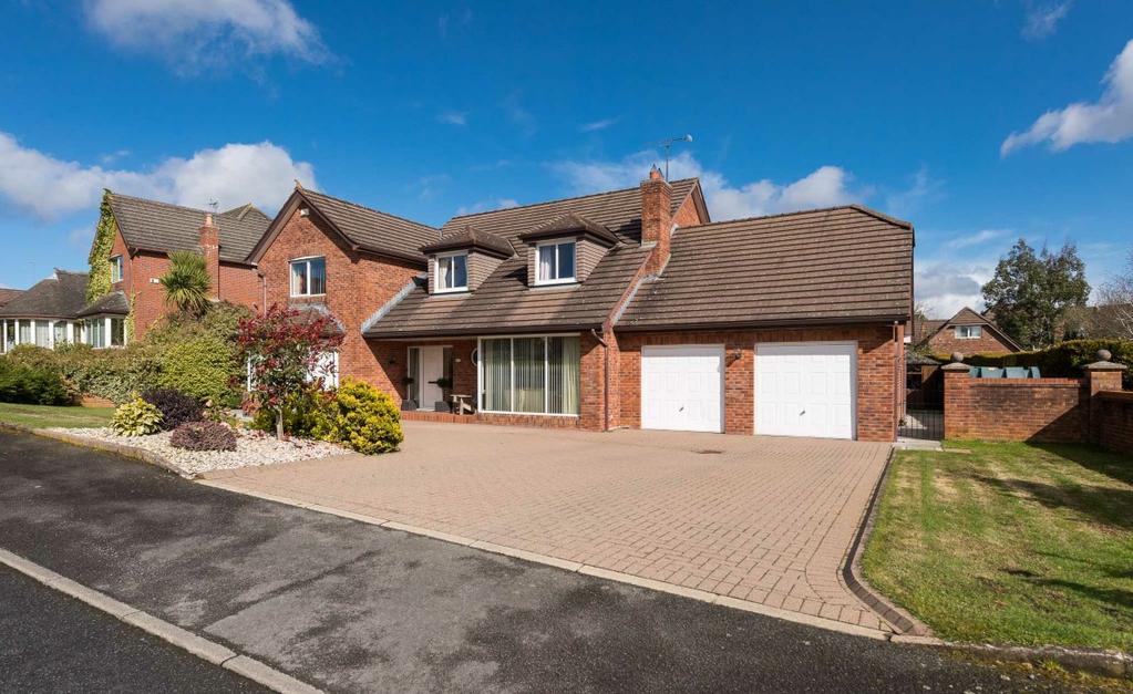 OUTSIDE Spacious brick Pavia driveway providing excellent parking space and leading to: INTEGRAL GARAGE 5.97m (19'7) x 5.