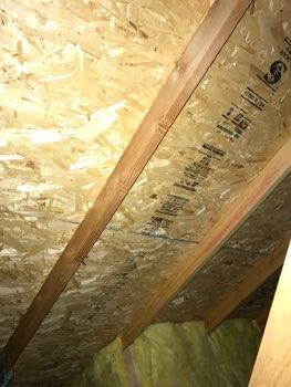Slight water penetration at roof anchor Painting in attic is an indication of