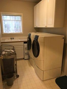 1. Location 1st Floor Laundry 2. Condition Ceiling and walls are in good condition overall. Accessible outlets operate. Light fixture operates. 3.