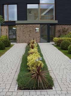 Abode Restrained Palette Both permeable and conventional concrete block paving, in a restrained