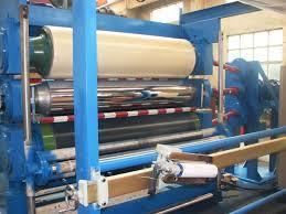 . Arrangement of plastic and steel roll Fabric feeding in calendar unit Out let