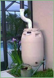 16. Place barrel on level, sturdy base. Direct downspout over the strainer. (Hooray, you now have a functioning rain barrel).