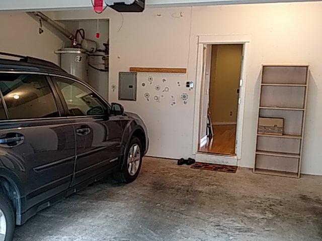 3. Garage garage view Styles & Materials Garage Door Type: One automatic Garage Door Material: Insulated Metal Auto-opener Manufacturer: GENIE 3.0 Garage Ceilings IN NI NP RR 3.