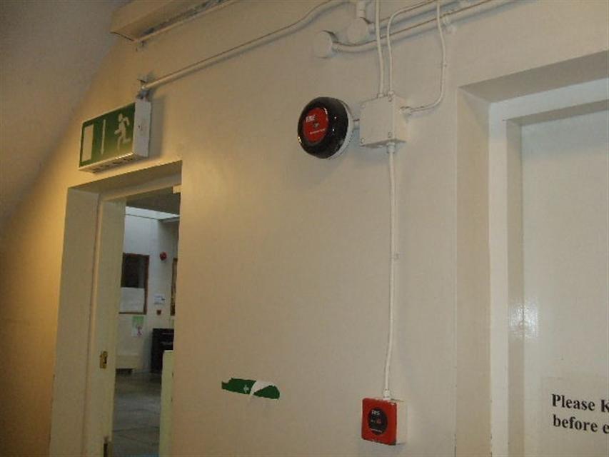 Example of fire exit sign,alarm sounder