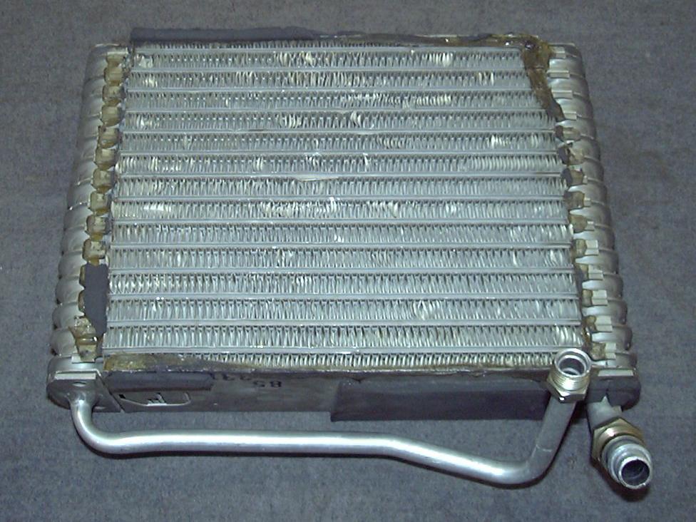 Evaporator in the passenger compartment low side