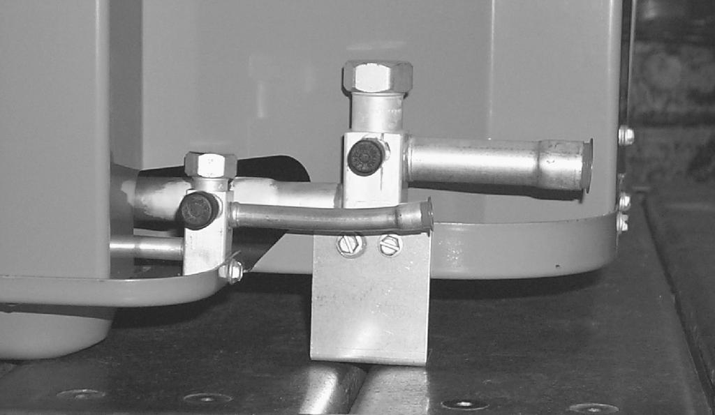 Split System Condensers Installation Instructions Clearance Hole (Some Units) Screw(s) securing bracket SHIPPING BRACKET A shipping bracket has been added to some chassis to increase the stacking