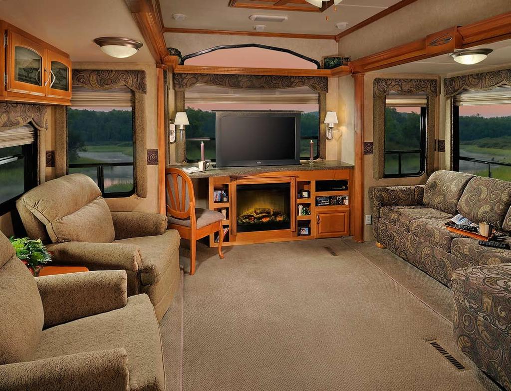 Relax and enjoy the luxurious comfort in our 36FTE model featuring overstuffed deluxe recliners and huge 100 long J-lounge with its built-in air mattress hide-a-bed while enjoying the 42 LCD TV that
