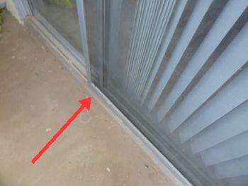 Sliding door screen tracks are dirty making the door difficult to operate. Recommend cleaning the tracks out. 8. Wall Condition Sliding screen door is torn.
