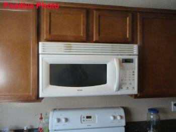 Built-in microwave ovens are tested using normal operating controls. Unit was tested and appeared to be serviceable at time of inspection.