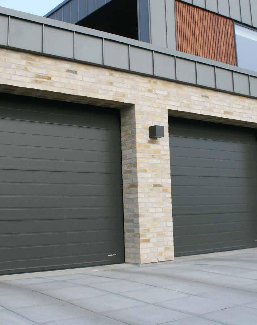 Garage door with special colour: Grey - RAL 7022 Stucco surface Lindab Garage doors Speedy delivery time Port sheet thickness of 46 mm Select Sablé colour and match the windows of the house Low U