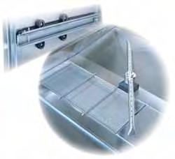 The washer utilizes a vertical sliding door, that slides downward into the washer frame to open, eliminating the need for additional ceiling height.