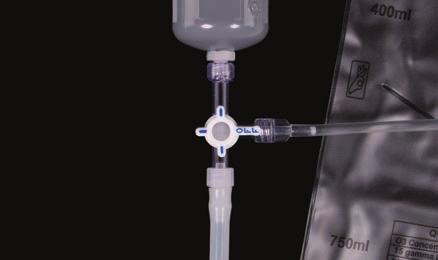When you are ready to fill your insufflation bag, attach the bag (G) to the side port of the ozone destruct system. Make sure the tubing is not clamped.
