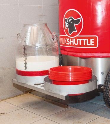 The can holder transports two milk cans or feed bowls to the hutches, thus saving an extra work step.
