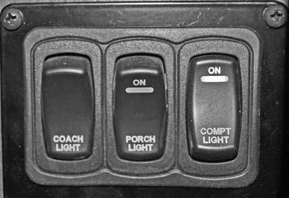 SECTION 12 MISCELLANEOUS NOTE: The Compartment Lights switch provides power to the compartment lights. You must manually turn each individual compartment light on or off inside of the compartments.