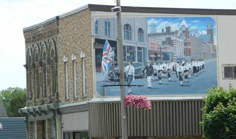 downtown. Enhance sidewalls that are visible to the public with windows, displays, and murals.